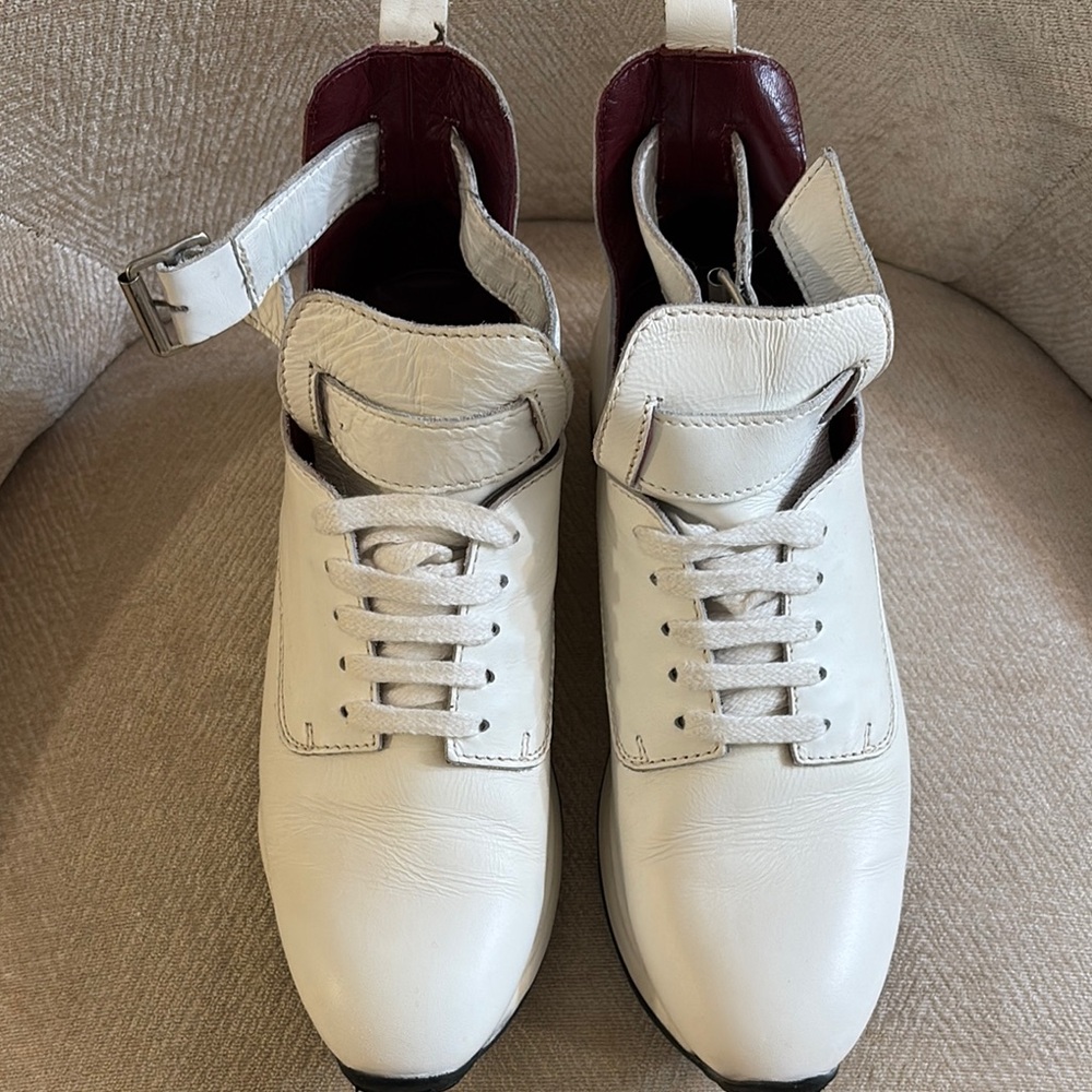 Woman’s white sneakers